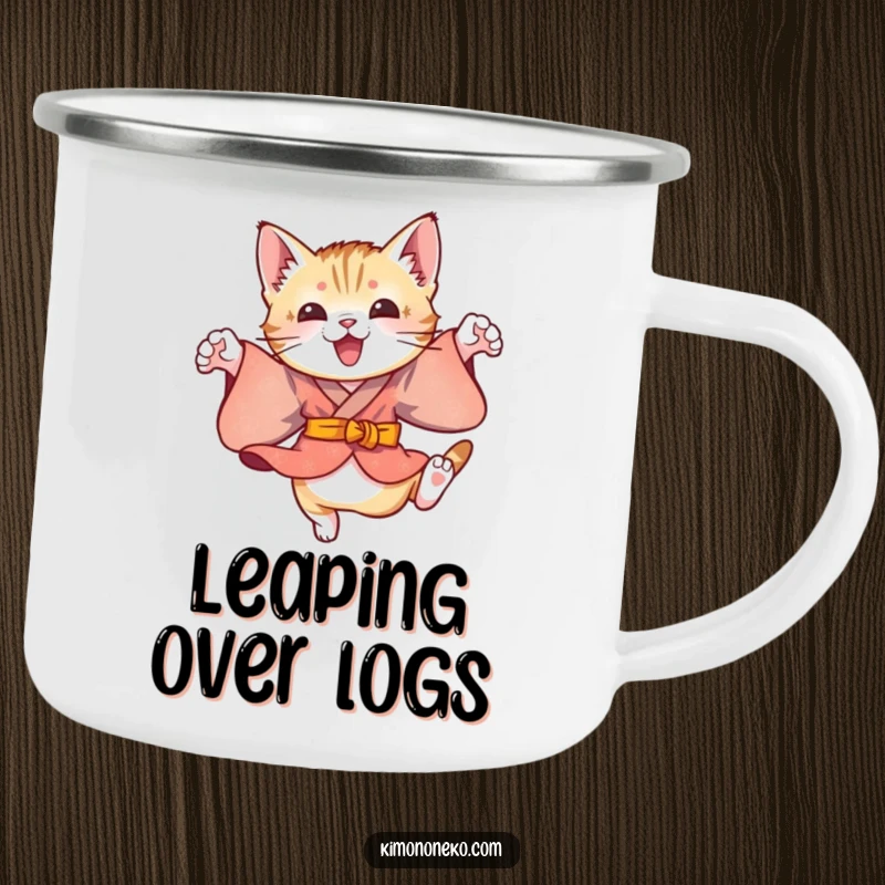 Funny enamel camping mug showcasing a playful kitten in a colorful kimono, performing energetic leaps, perfect for outdoor drinks.