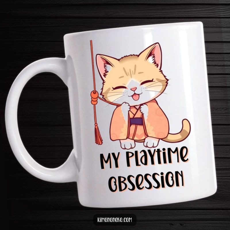 Funny mug with a mischievous cat in a patterned kimono playfully batting at a dangling silk cord, exuding pure chaotic joy.