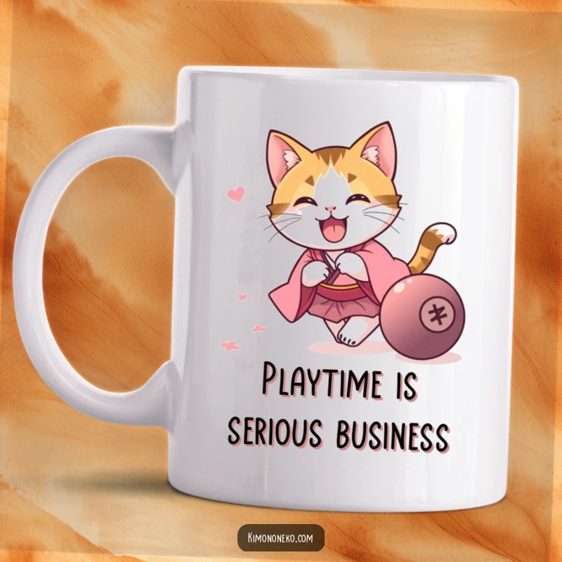 Funny kawaii calico cat in a pink kimono, enthusiastically chasing a rolling ball, on a vibrant and funny mug.