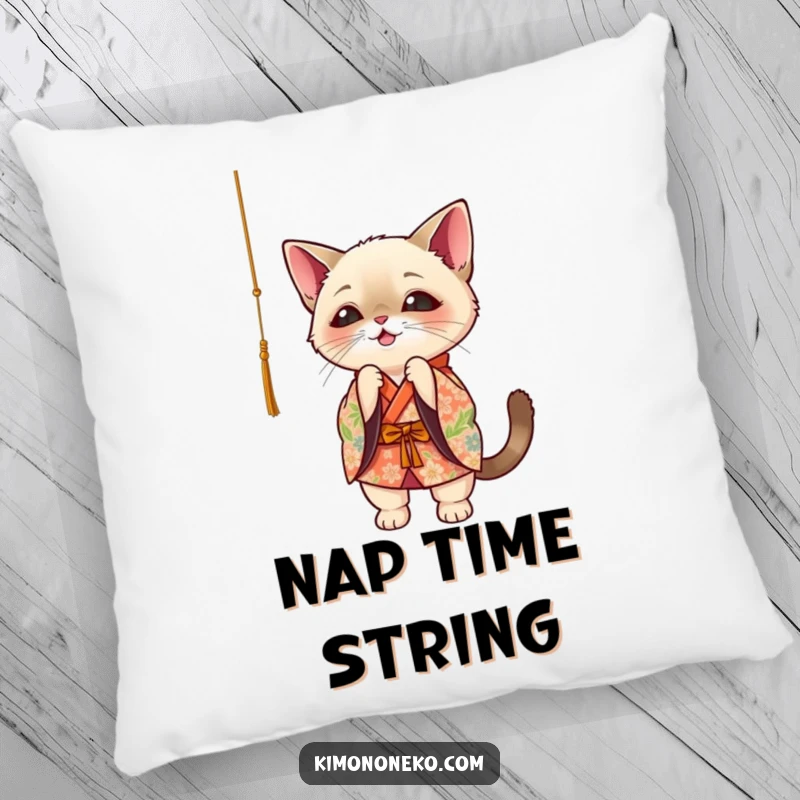 Funny Siamese cat in floral kimono, playfully batting at a dangling string, kawaii style pillow.