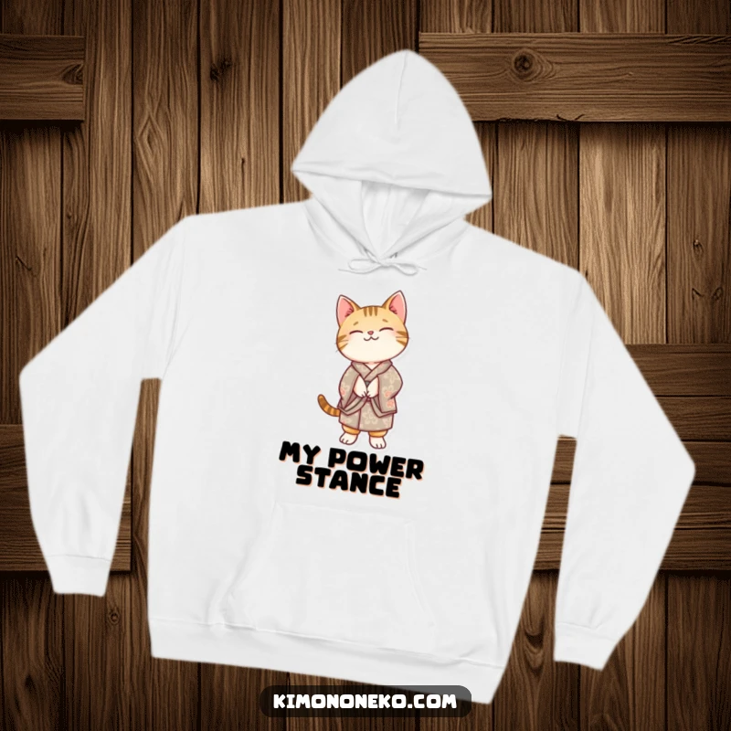 Funny Kawaii tabby cat in a patterned kimono, balancing on its hind legs, ready for cozy laughs in this hoodie.
