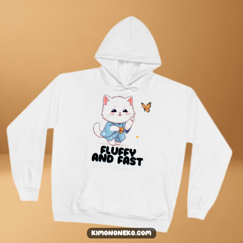 Funny fluffy white kawaii cat in a blue kimono playfully chasing a butterfly, a scene of gentle pursuit on a warm hoodie.