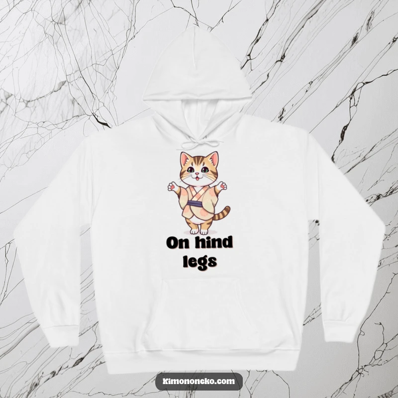 Funny Tabby Cat Kimono Hoodie: Cozy hoodie featuring a Kawaii tabby cat in a patterned kimono, balancing on its hind legs with charm.