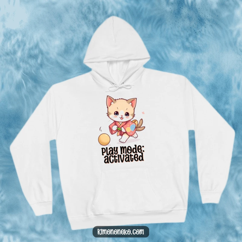 Funny playful kitten kimono hoodie, showcasing a kitten in a colorful kimono chasing a ball, offering warmth and vibrant, energetic feline fun.