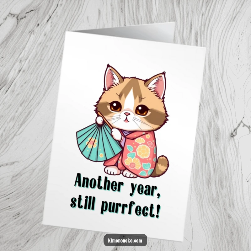 Funny Free Printable Birthday Card of a Kawaii Scottish Fold cat in a colorful kimono, peeking playfully from behind a fan.