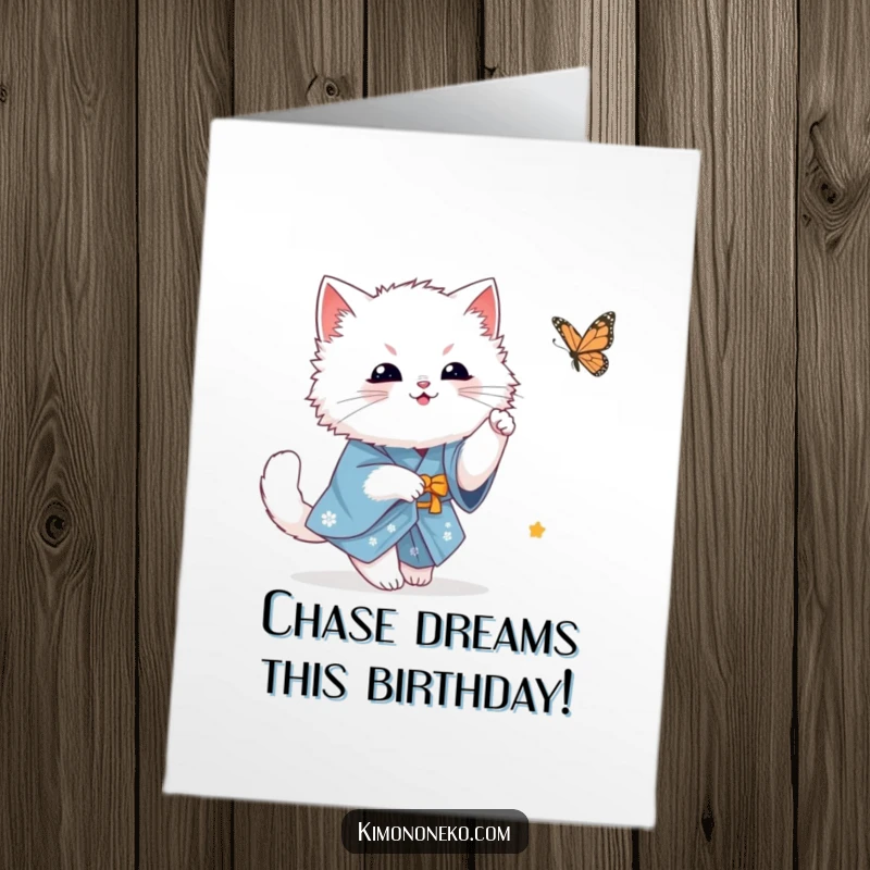 Funny Free Printable Birthday Card: Fluffy white kawaii cat in blue kimono chasing a butterfly playfully, a cute downloadable.