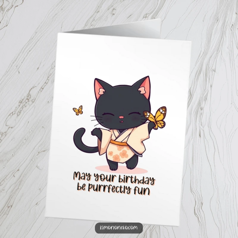 Funny Free Printable Black Cat Birthday Card: Black cat in a simple kimono playfully leaping after a butterfly, capturing joyful motion.