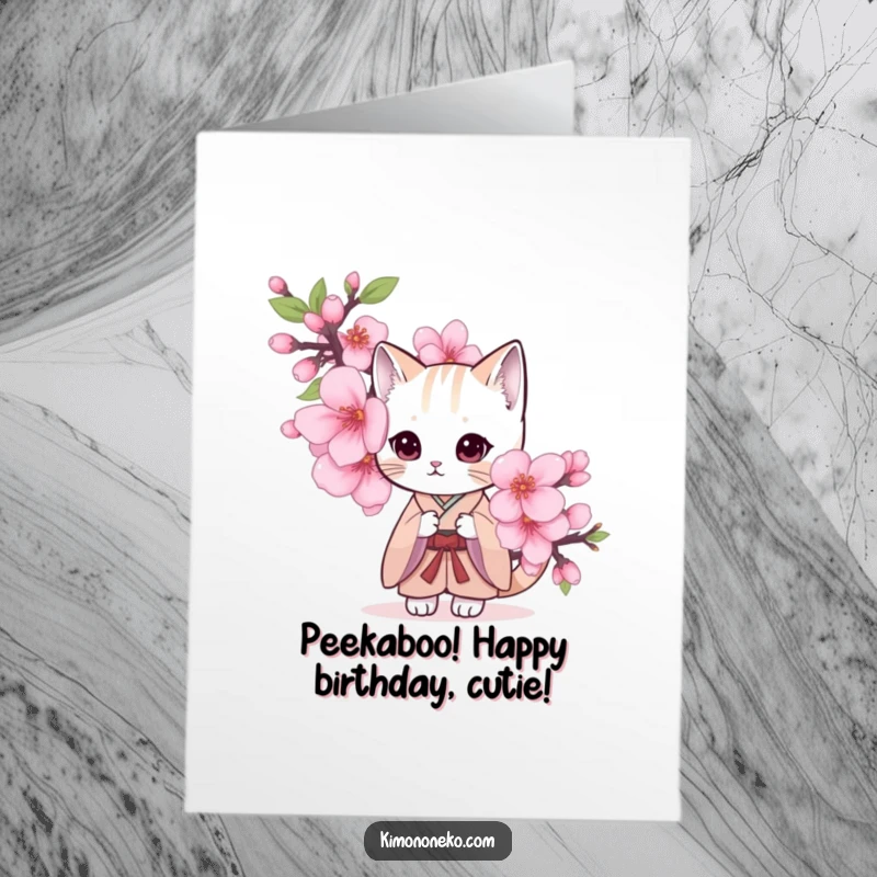 Funny Free Printable Birthday Card: a shy cat in a simple kimono peeking from behind a large cherry blossom, a sweet and funny greeting.
