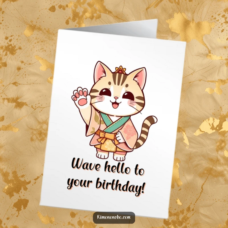 Funny Free Printable Birthday Card featuring a striped cat in a festive kimono cheerfully waving a paw hello.