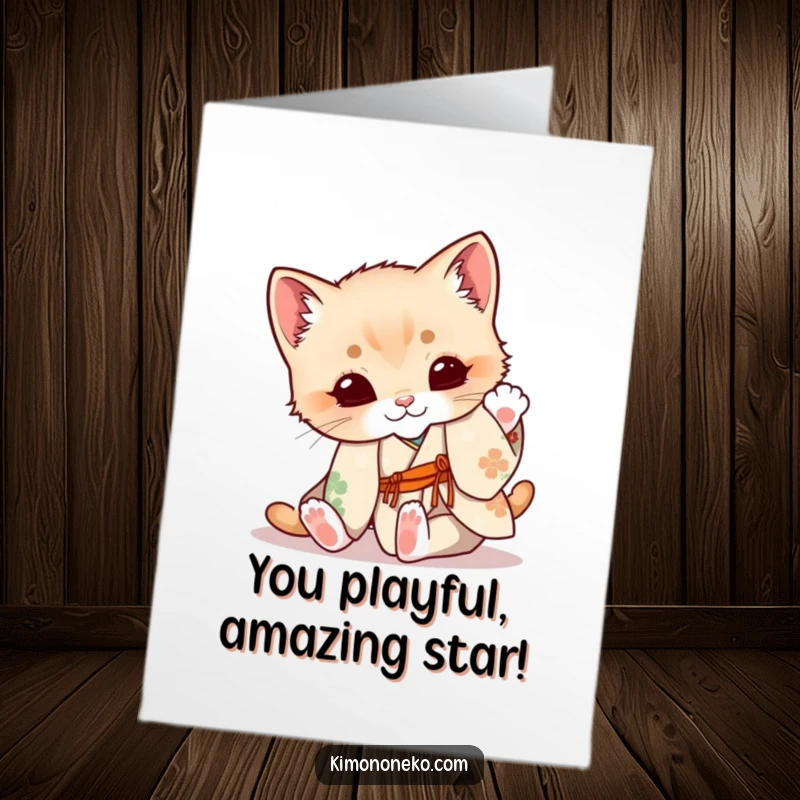 Funny Free Printable Congrats Card: A cute kitten in a floral kimono playfully tumbling to celebrate their success.