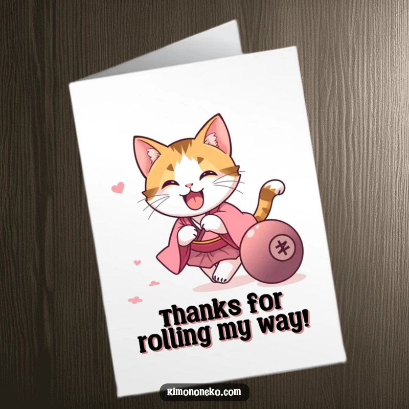 Funny Free Printable Thank You Card with a playful kawaii calico cat in a pink kimono chasing a rolling ball, expressing thanks.