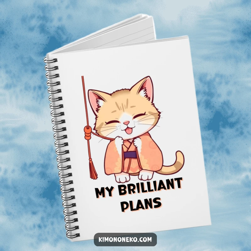 Funny notebook cover showing a mischievous cat in a patterned kimono, batting at a dangling silk cord, inspiring creative and humorous note-taking.
