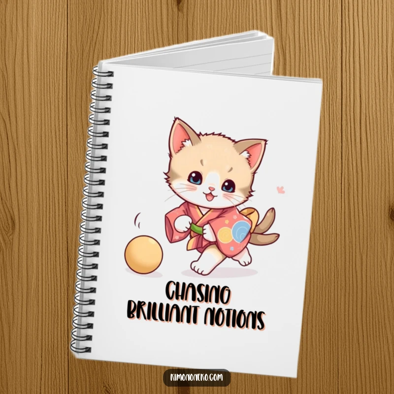 Funny playful kitten kimono notebook, with a kitten chasing a ball, perfect for jotting down notes with a touch of vibrant feline fun.