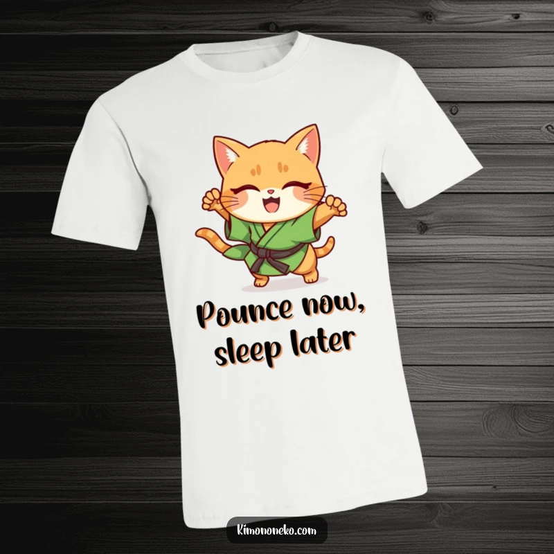 Funny ginger cat in green kimono, performing a sudden pounce, kawaii style, action t-shirt.