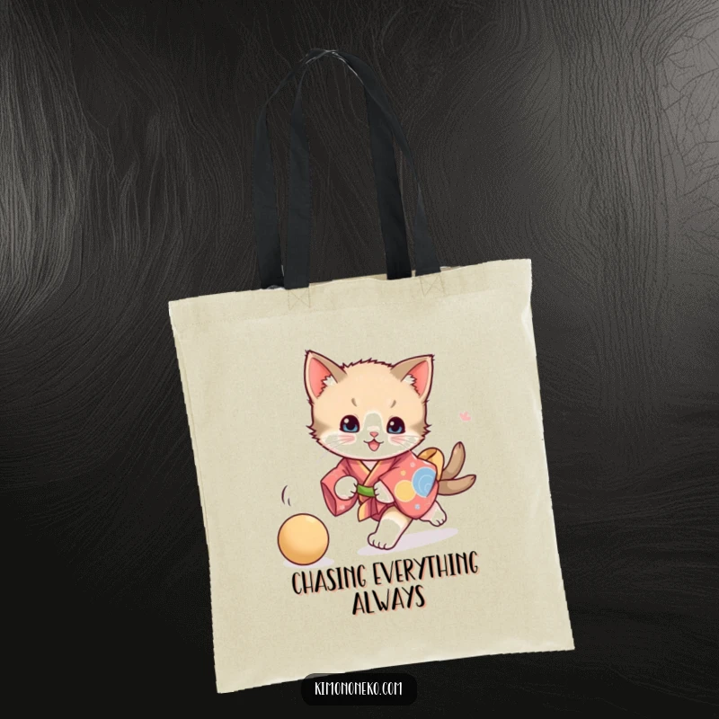 Funny playful kitten kimono tote bag, depicting a kitten energetically chasing a ball, ideal for carrying items with vibrant feline charm.