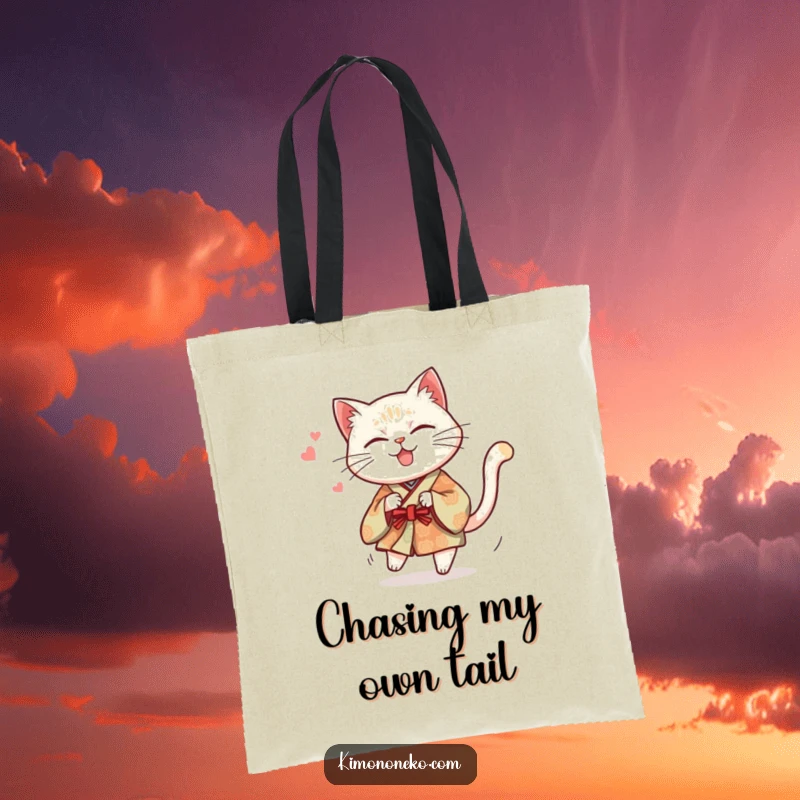 Funny tote bag with a mischievous cat in a traditional kimono hilariously chasing its tail, perfect for carrying your fun.