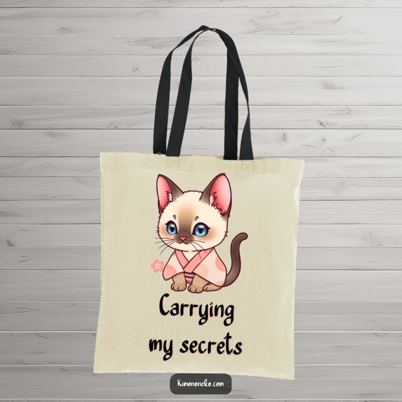 Funny Siamese cat in a patterned kimono, looking curious. This tote bag is ideal for humor-loving cat owners.