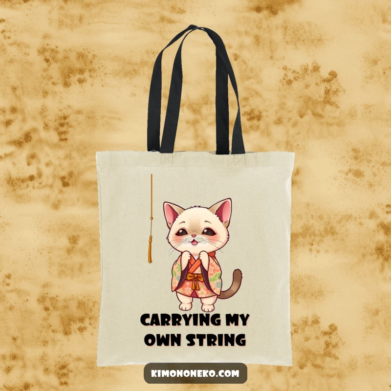 Funny Siamese cat in floral kimono, playfully batting at a dangling string, kawaii style tote bag.